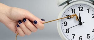 Hand pulling clock with thread