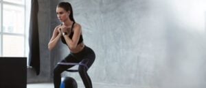 Woman exercising in sports apparel