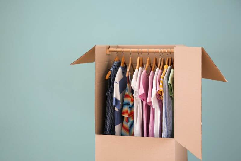Rack of clothing inside box