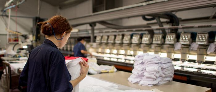 Fashion designer in apparel factory